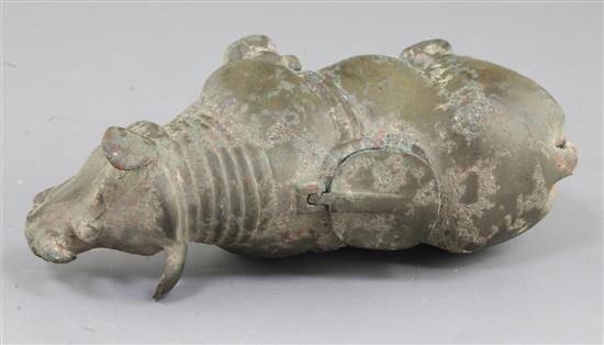 A rare Chinese archaic bronze ritual rhinoceros wine vessel, Zun, early Western Han dynasty, 206 B.C. - 9 A.D. 11.8cm high, 21cm long